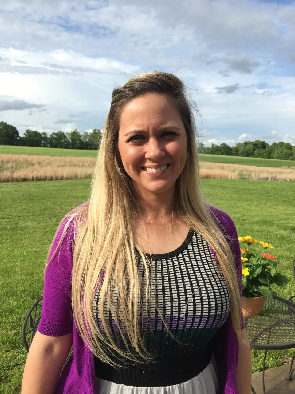 Alexis O’Brien standing on the golf course.